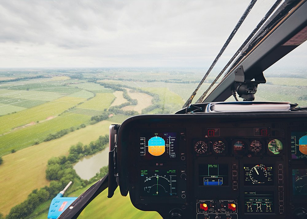 View from the front seat of a helicopter.